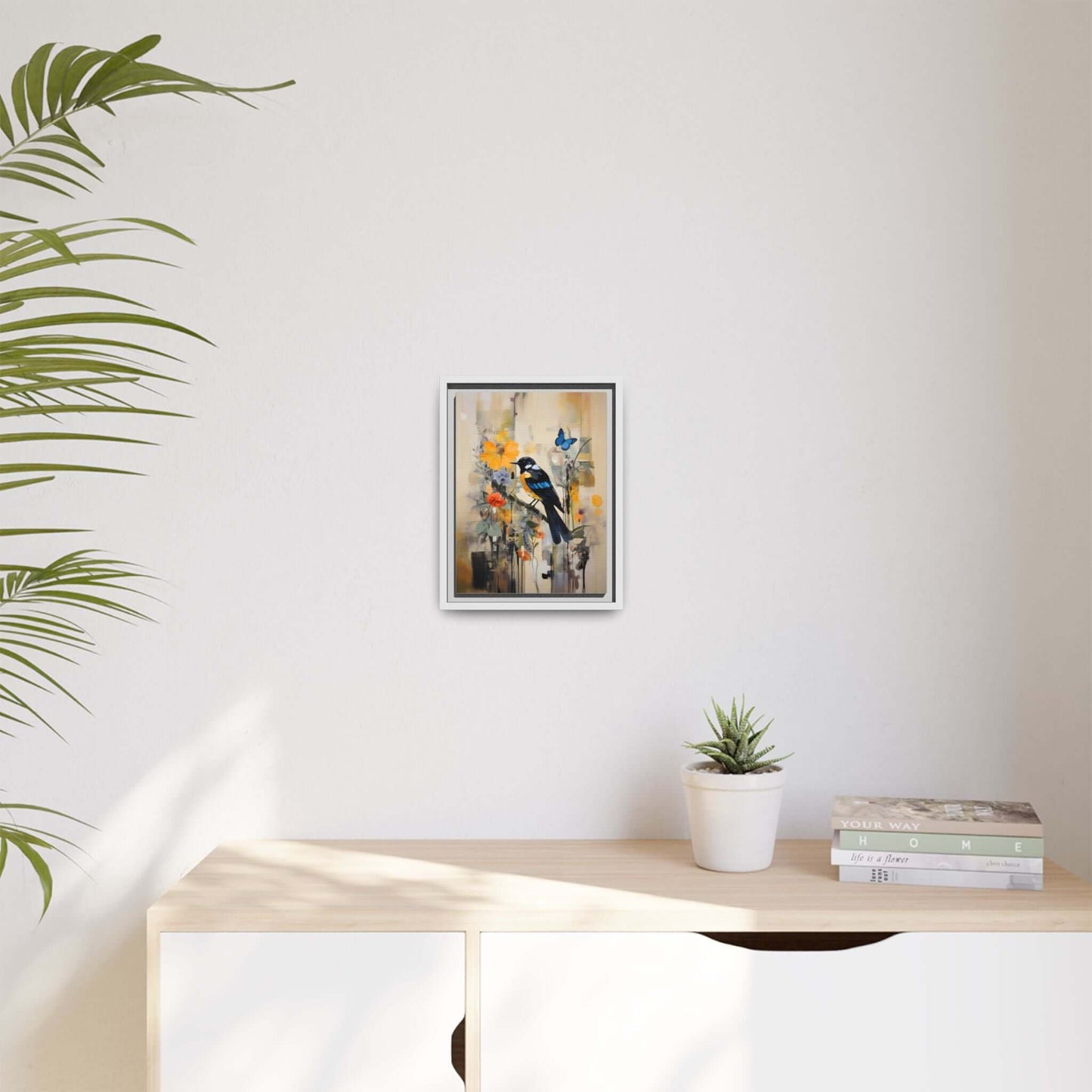 Framed colorful bird and butterfly canvas art on wall, vibrant home decor with plant and books, 8" x 10" vertical artwork