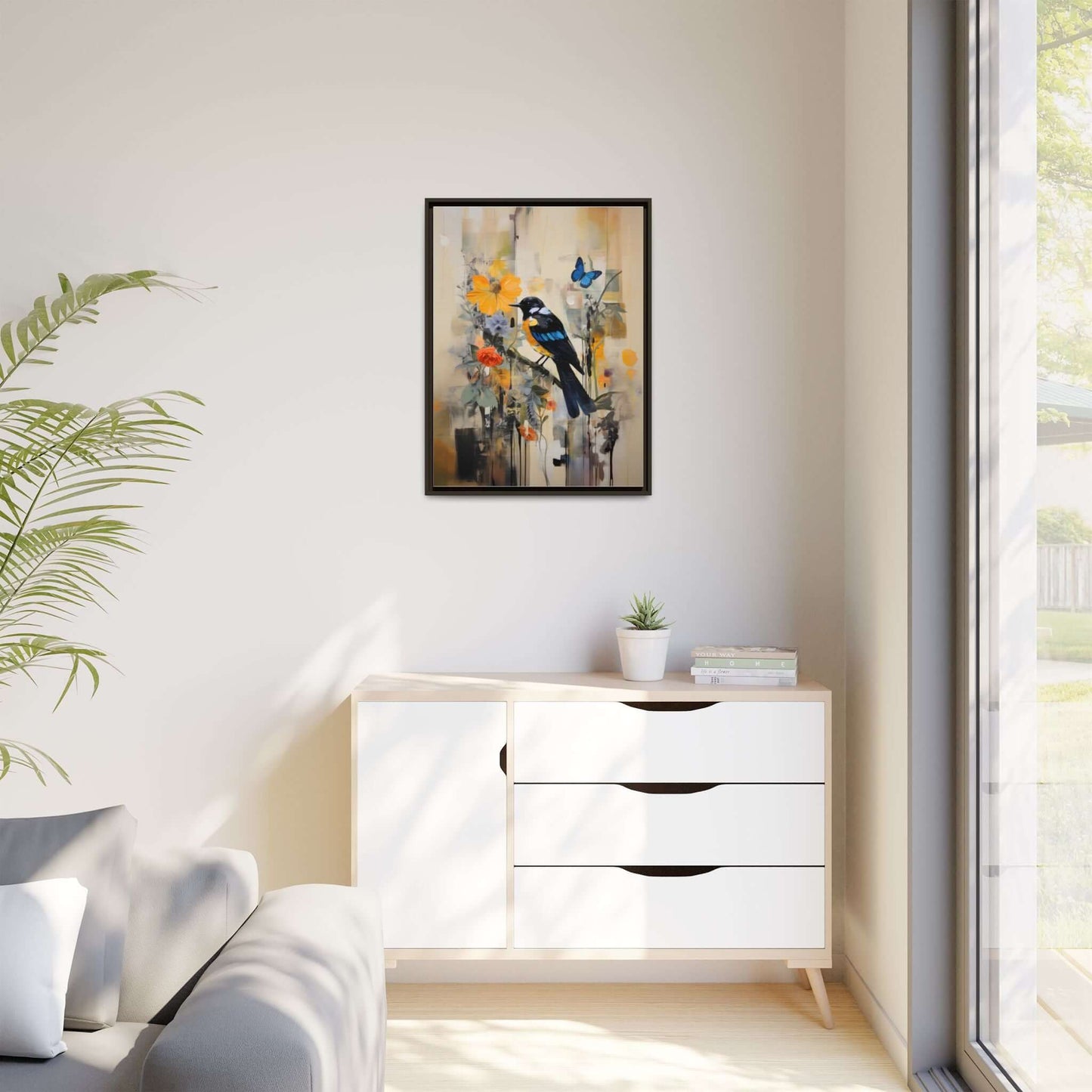 Framed colorful bird and butterfly canvas art in a bright living room, enhancing vibrant home decor with nature-inspired design.