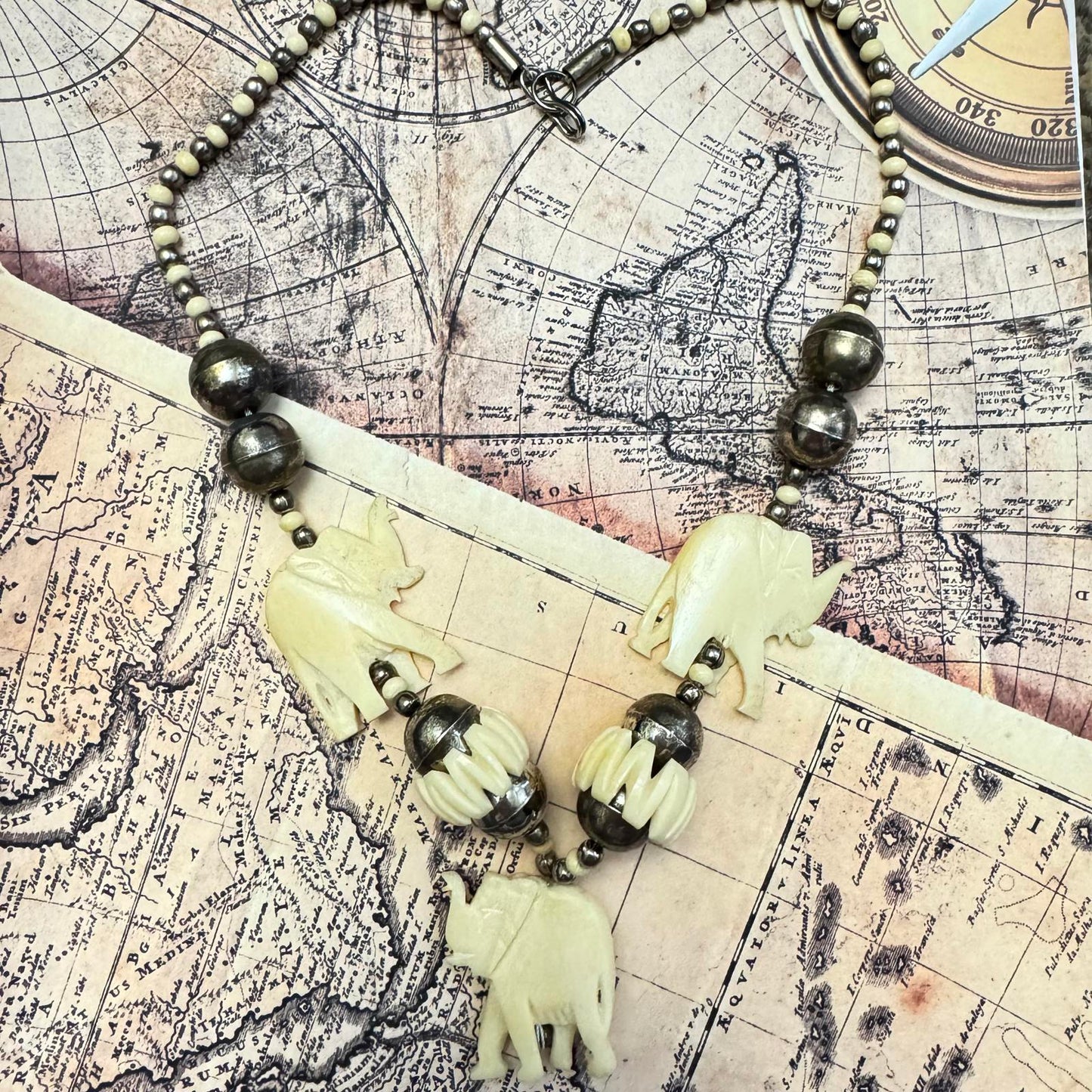 Vintage Hand carved Elephant Pendant Necklace with Antiqued Silver Tone Accents