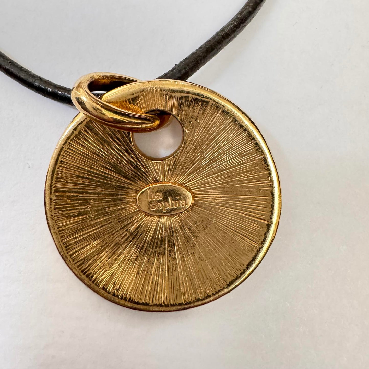 Signed Lia Sophia Gold Tone Round Pendant Necklace – Black Cord Modern Boho