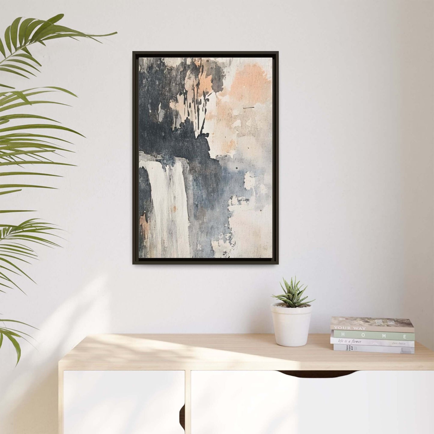 Framed vertical watercolor waterfall art print in a minimalist living space, enhancing modern home decor.