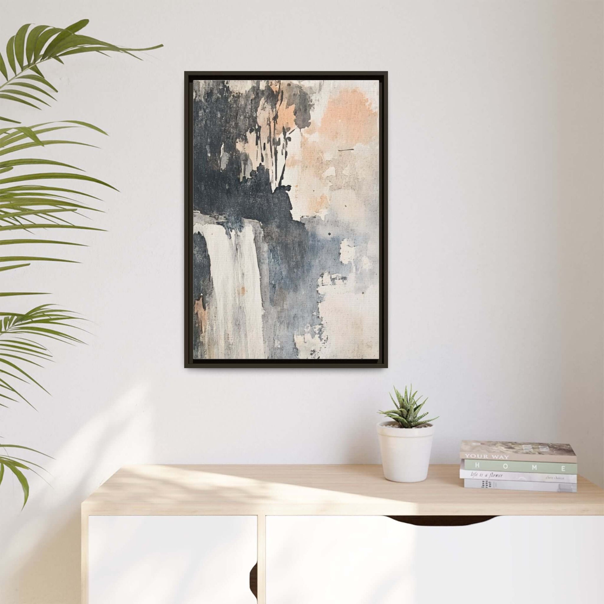 Framed vertical watercolor waterfall art print in a minimalist living space, enhancing modern home decor.