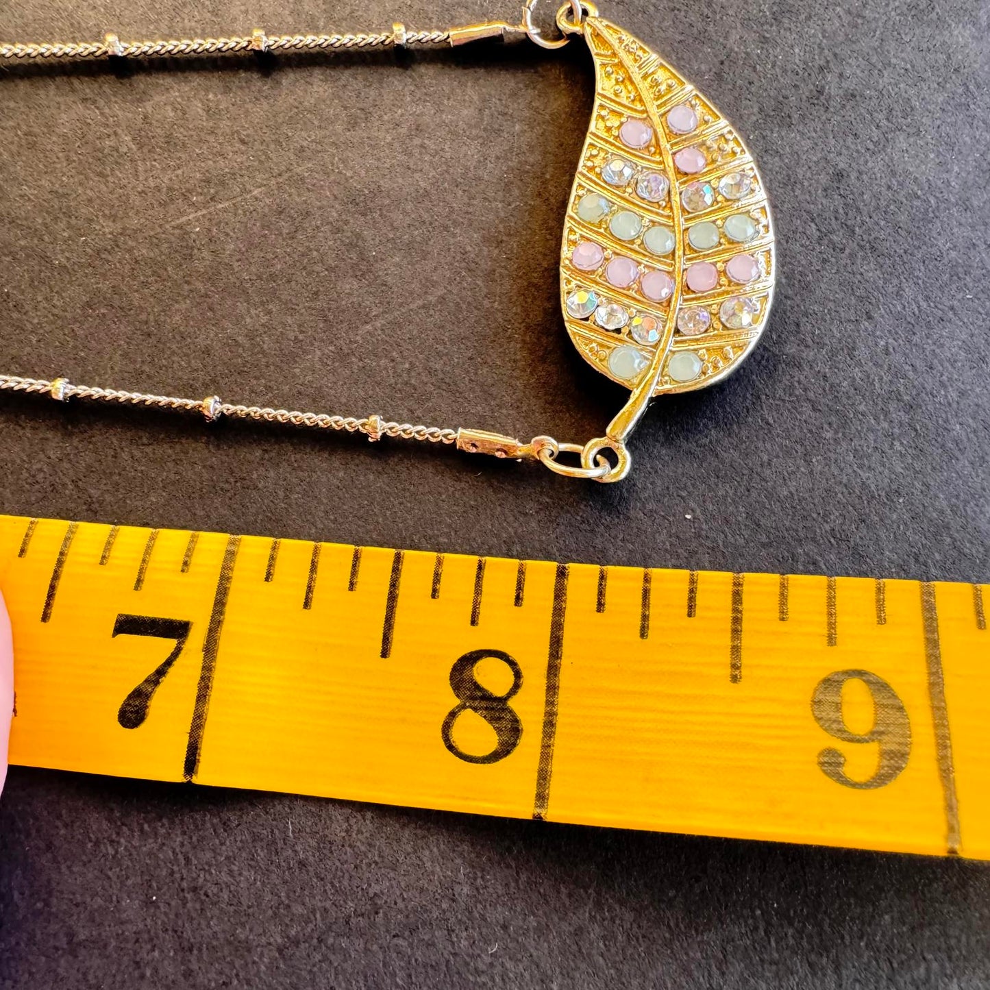 Elegant Leaf Pendant Necklace with Shimmering Stones