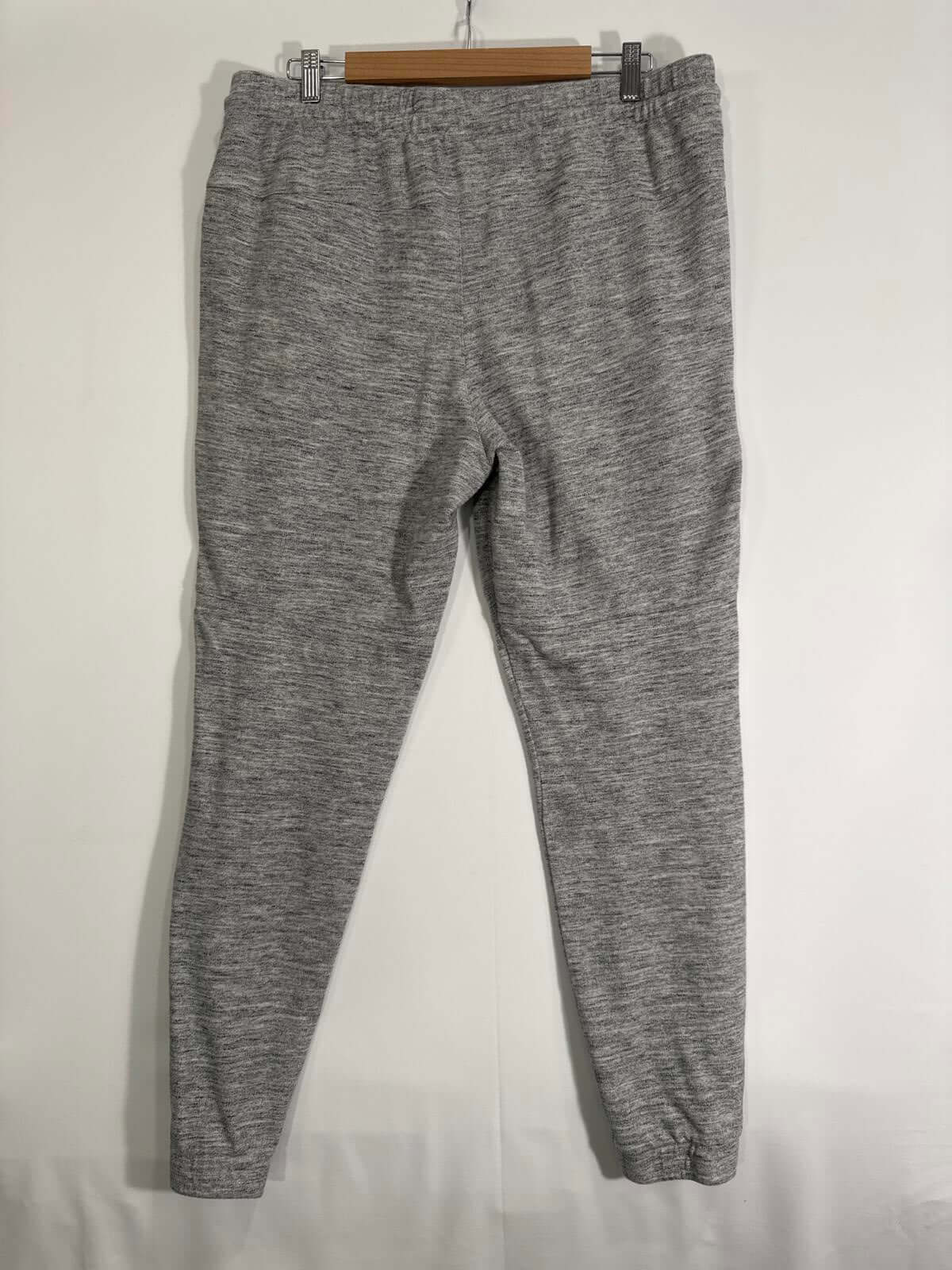 Gray Adidas Jogger Pants featuring soft fabric, elastic waistband, and tapered leg design, ideal for workouts and lounging.
