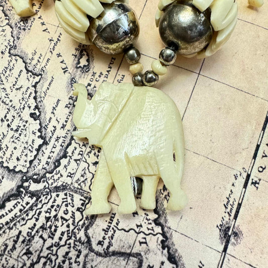 Vintage Hand carved Elephant Pendant Necklace with Antiqued Silver Tone Accents