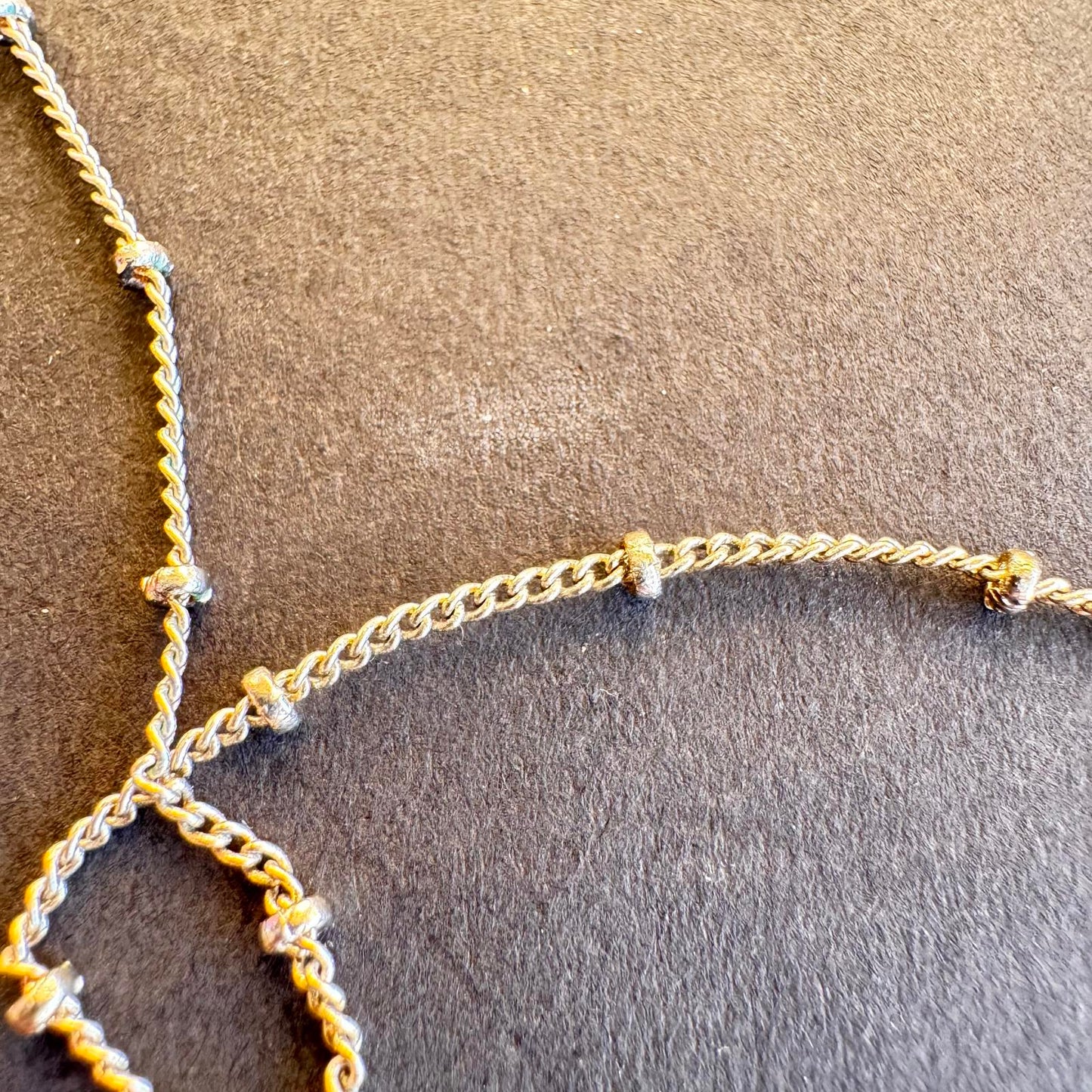 Elegant Leaf Pendant Necklace with Shimmering Stones