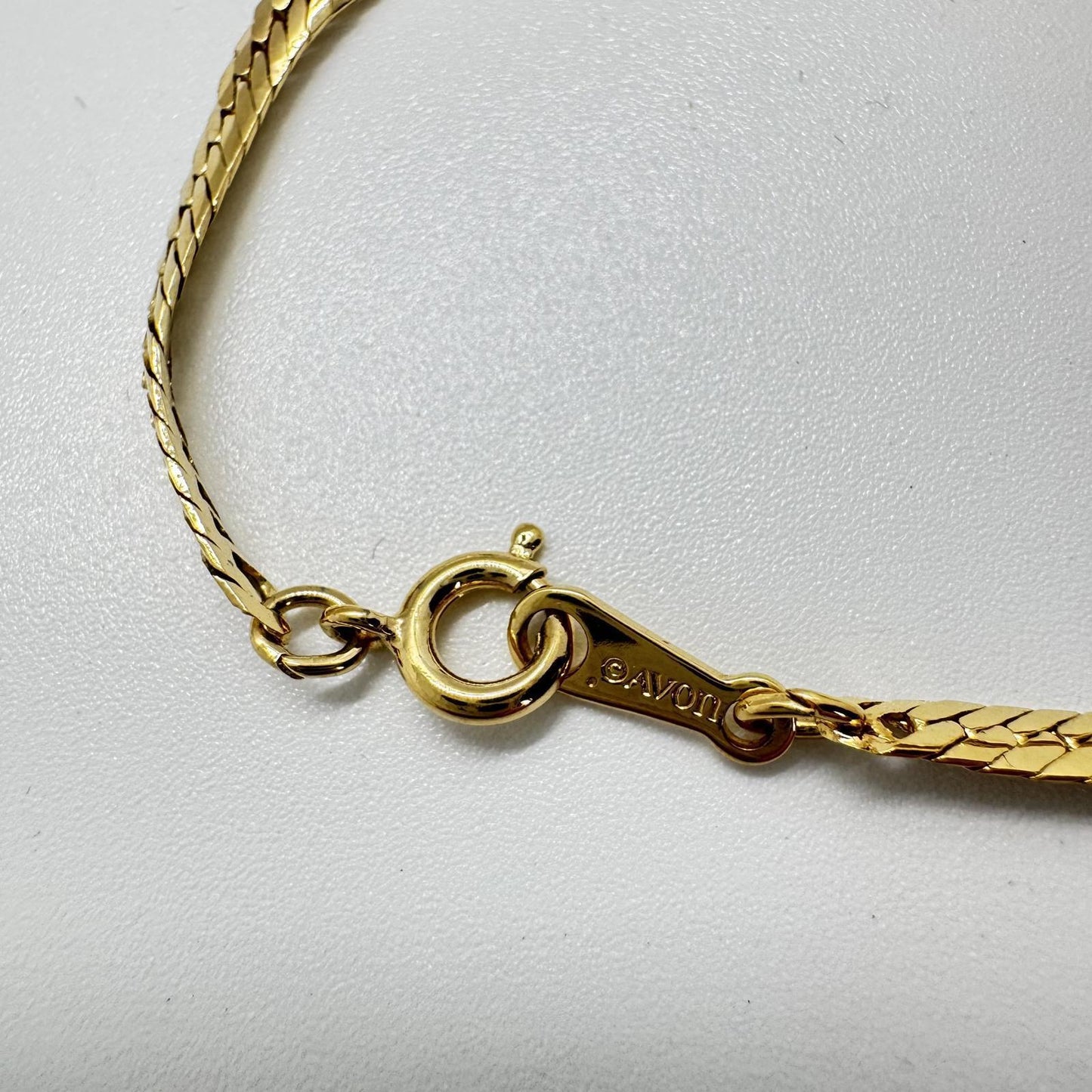 Vintage Avon Gold-Tone Rhinestone Bracelet – Twisted Wave Link Design