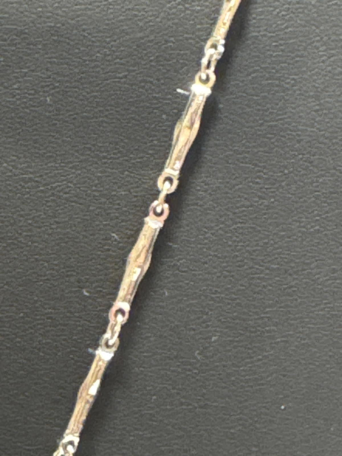 Elegant Silver -Tone Statement Necklace with Unique Design