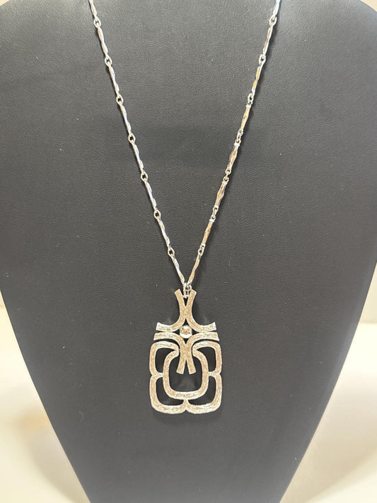 Elegant Silver -Tone Statement Necklace with Unique Design