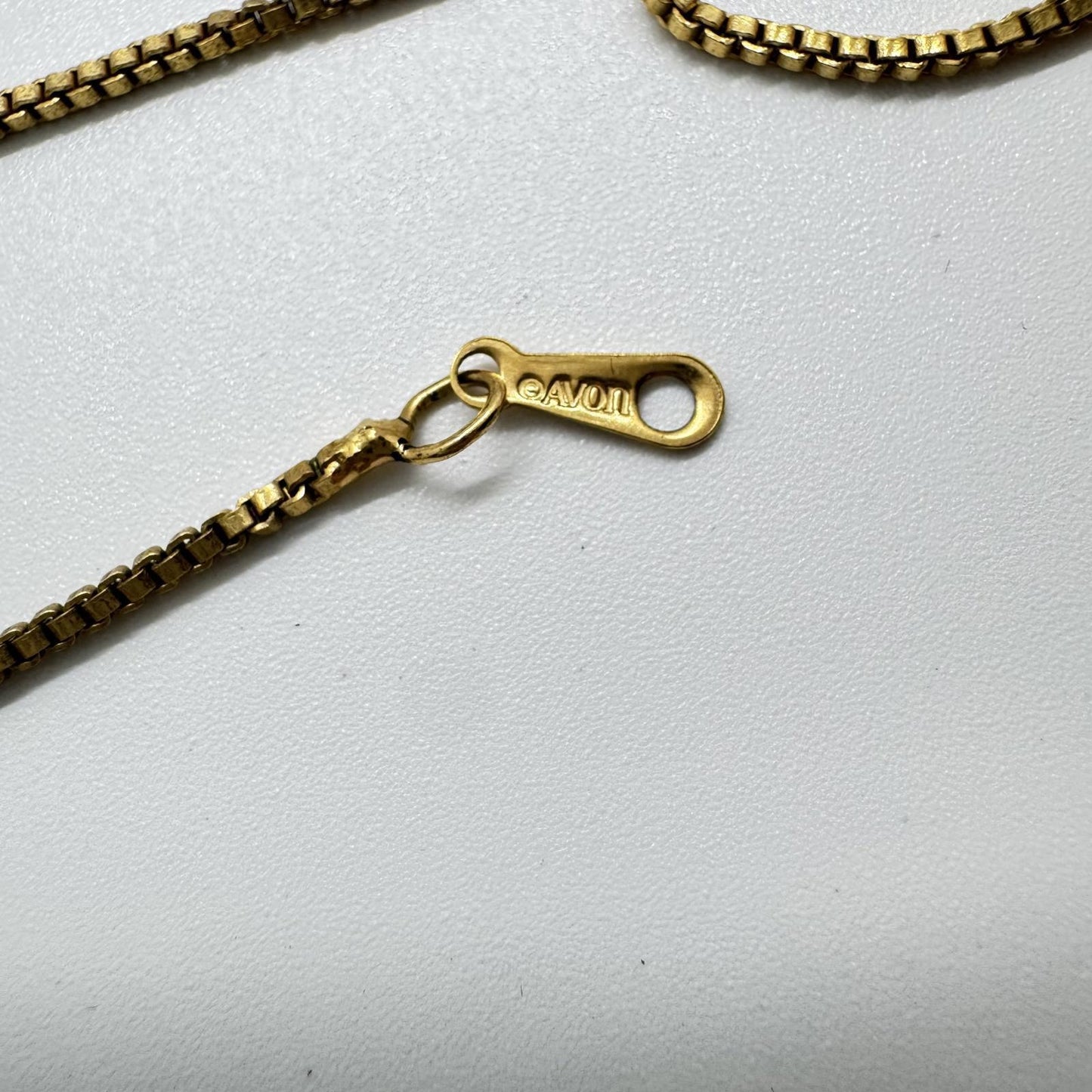 Vintage Avon Gold-Tone Flip Pendant Necklace – Black & White Reversible Stone