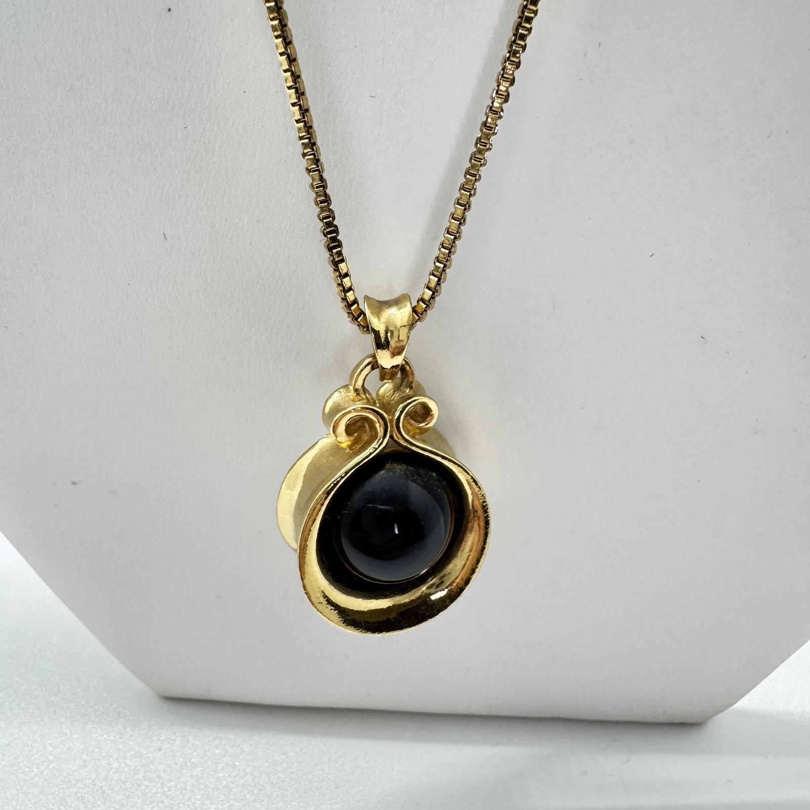 Vintage Avon Gold-Tone Flip Pendant Necklace – Black & White Reversible Stone