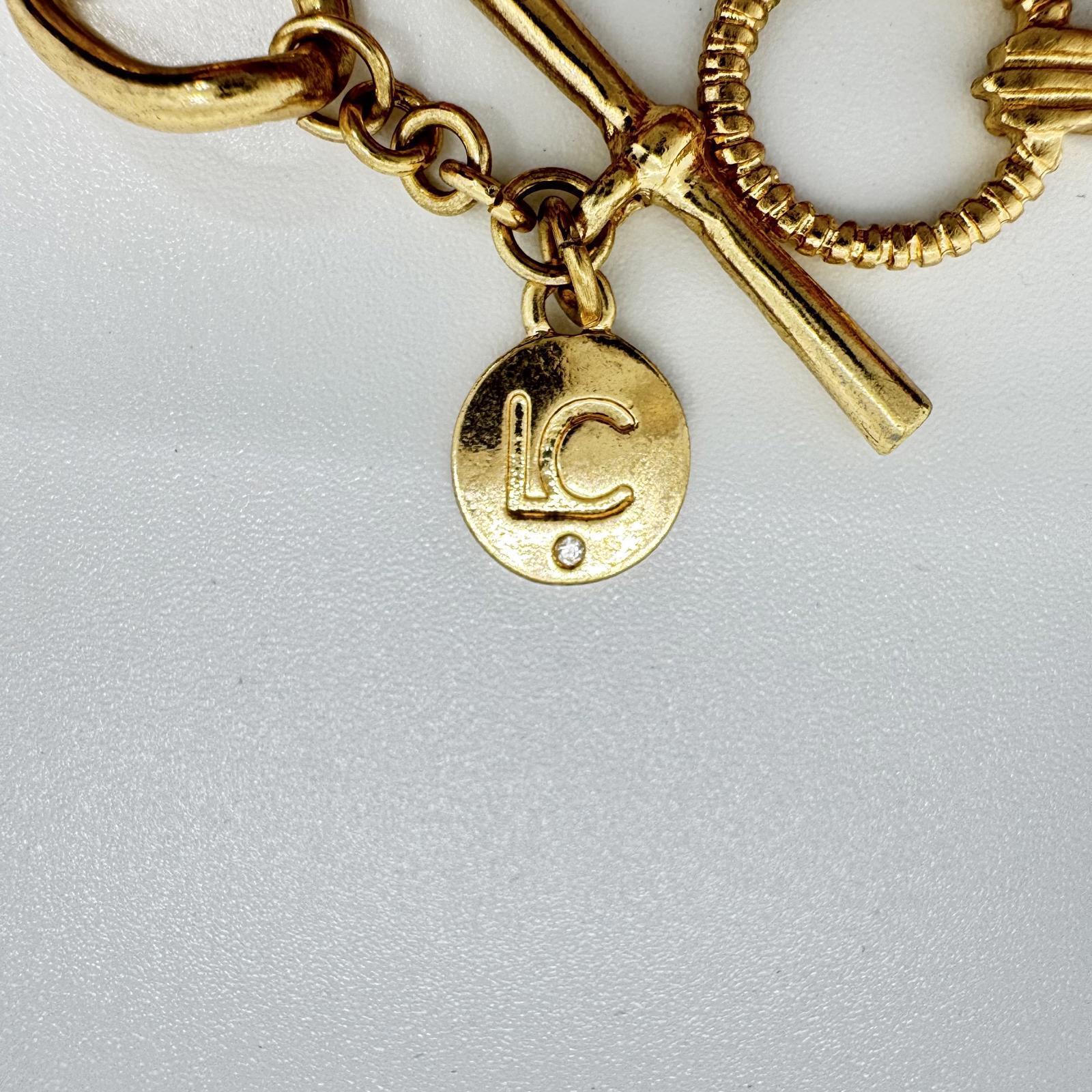 Liz Claiborne Gold-Tone Heart Charm Bracelet – Rhinestone Pave Toggle Chain