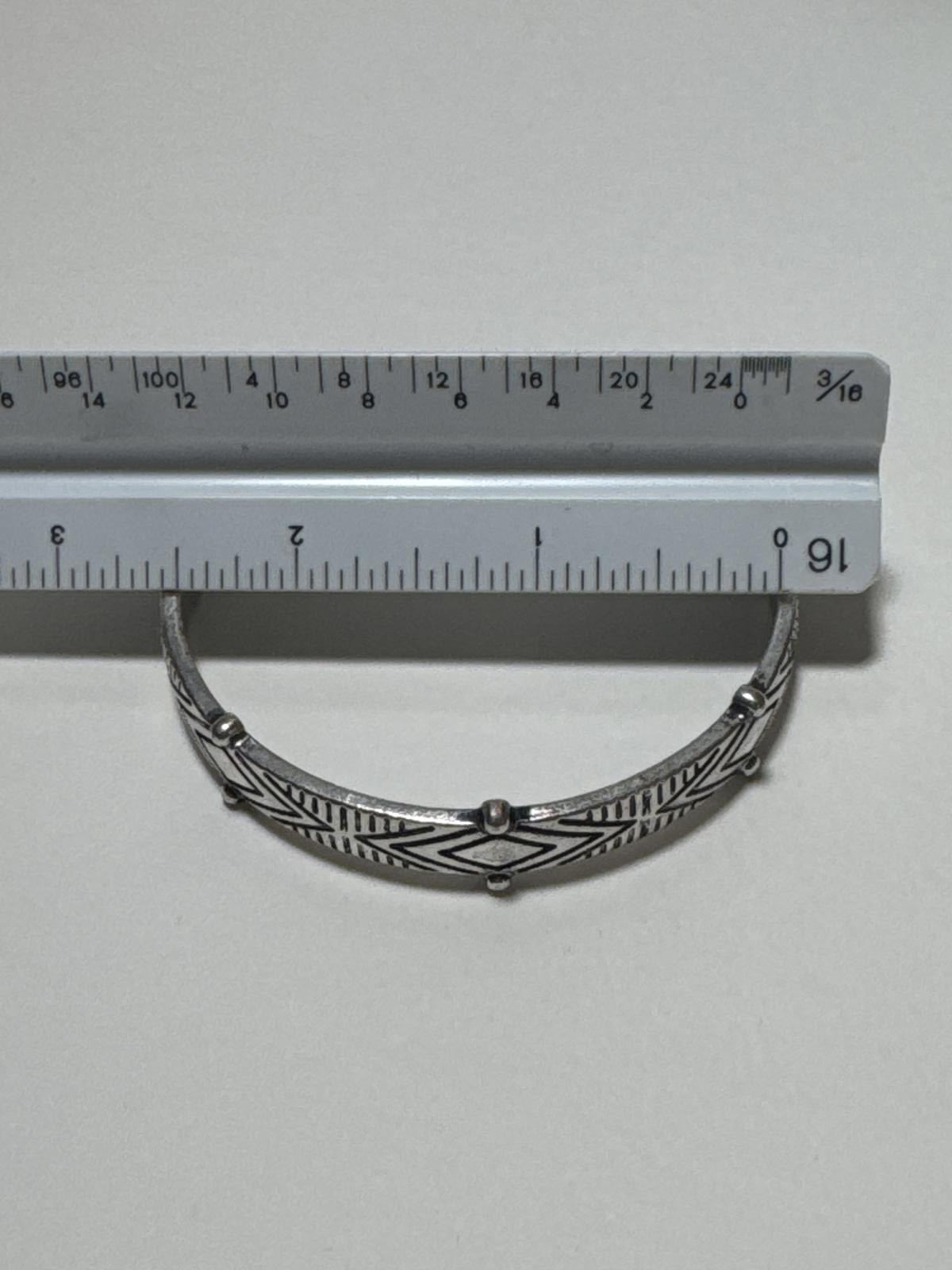Vintage Silver Tone Bangle Bracelet with Geometric Design