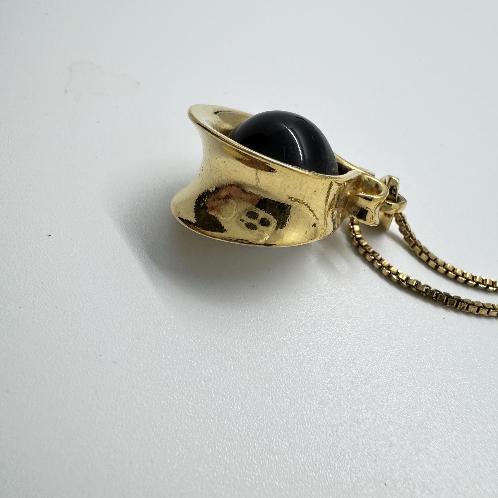 Vintage Avon Gold-Tone Flip Pendant Necklace – Black & White Reversible Stone