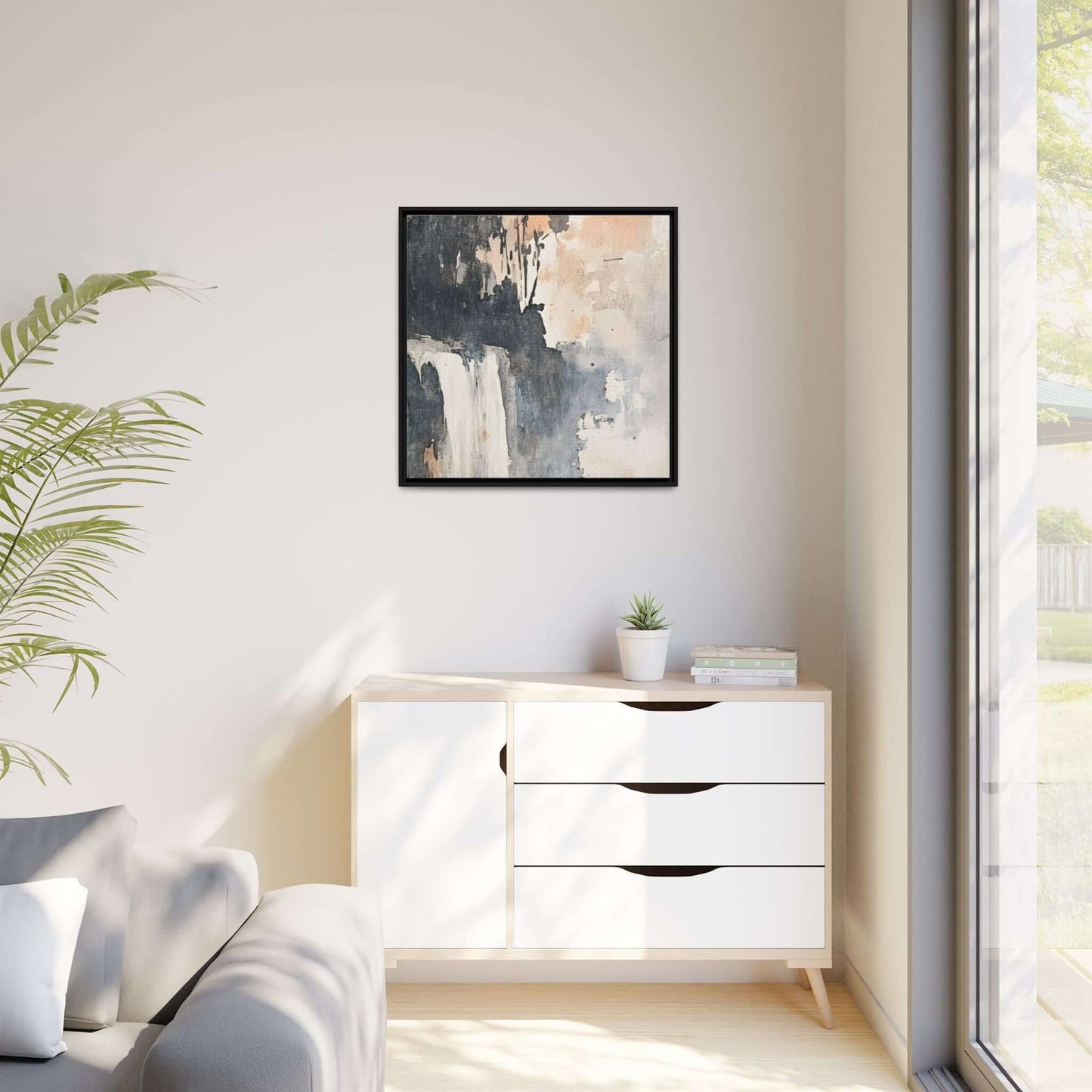 Framed waterfall art print on matte canvas, displayed in a modern living room, enhancing home decor with a vertical orientation.