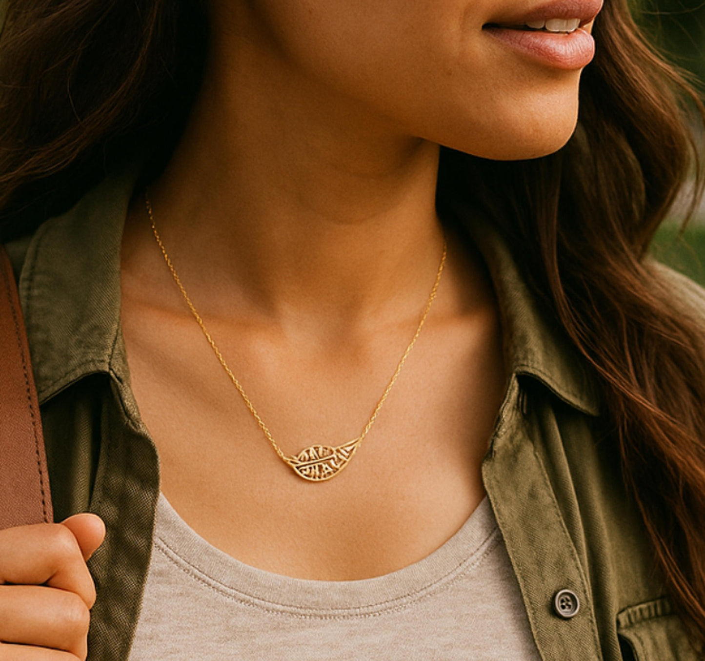 Elegant Leaf Pendant Necklace with Shimmering Stones