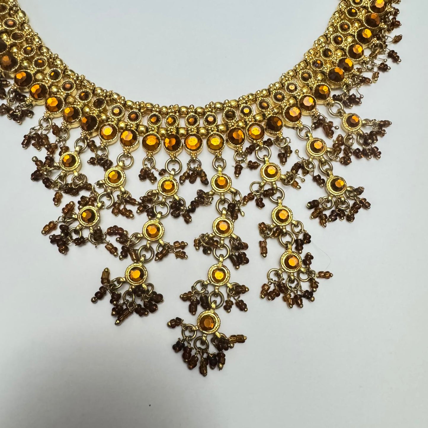 Elegant Bohemian Statement Necklace with Golden and Amber Accents