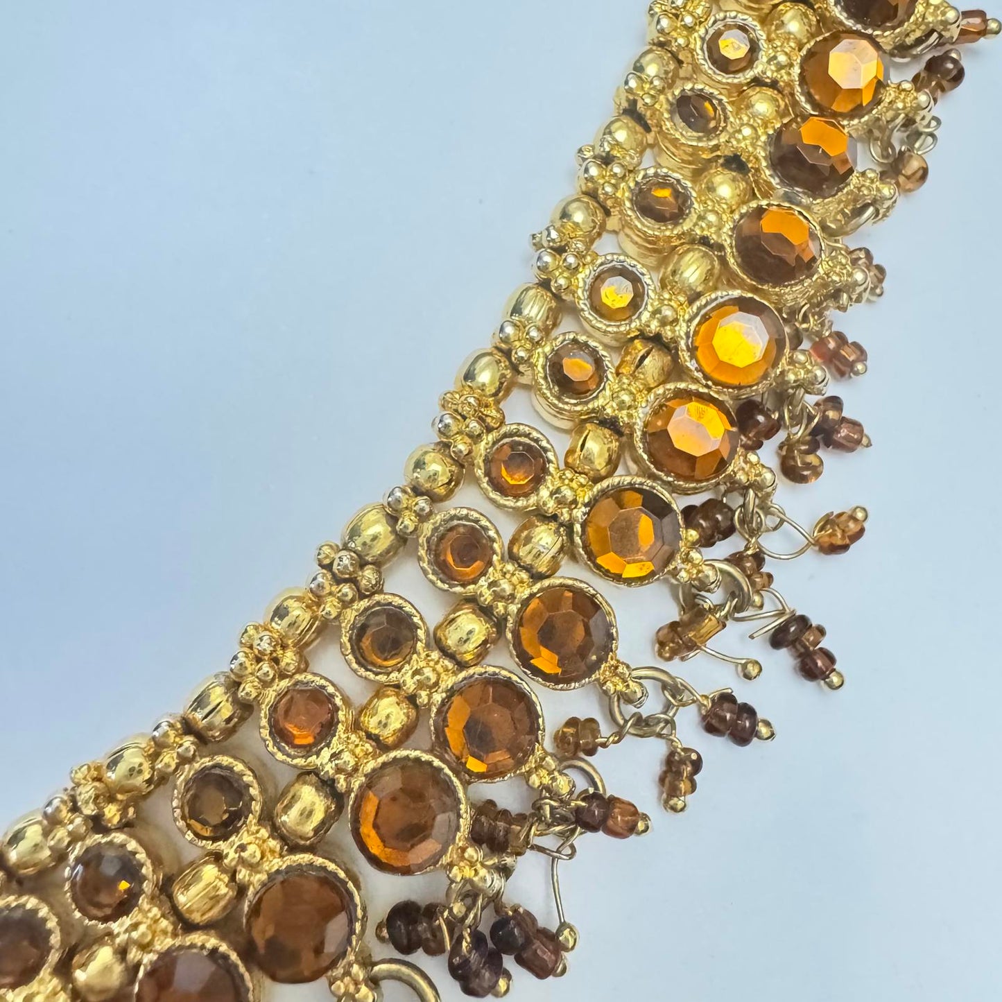 Elegant Bohemian Statement Necklace with Golden and Amber Accents